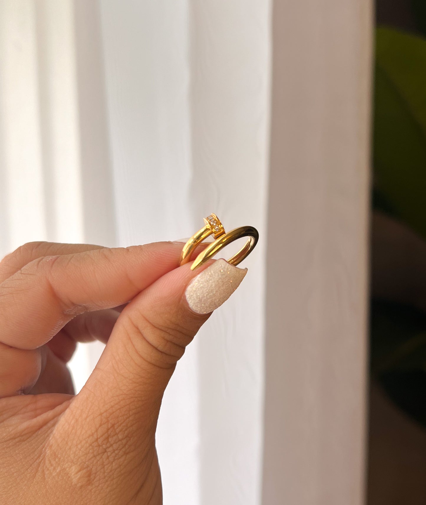 NAIL RING