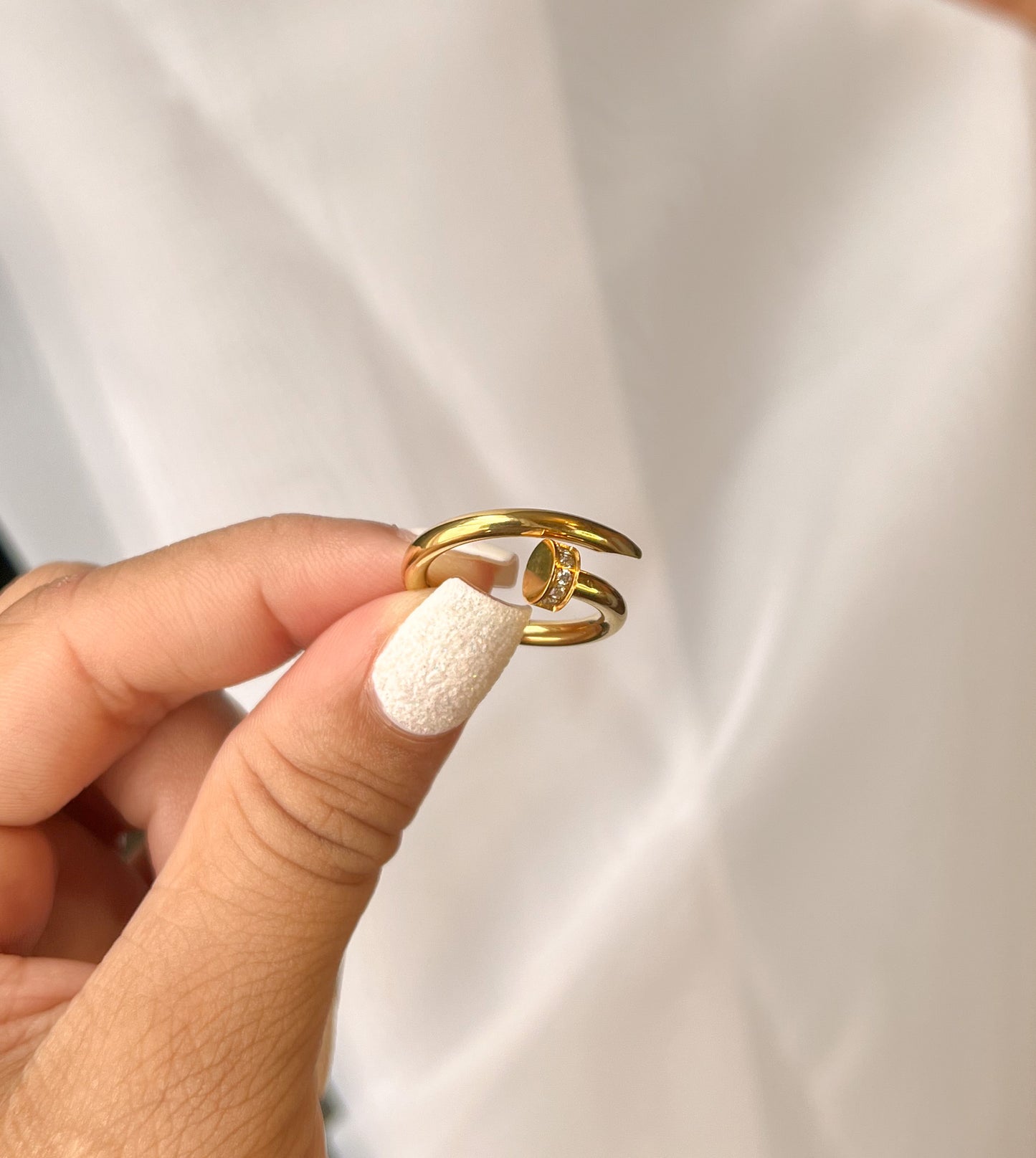 NAIL RING
